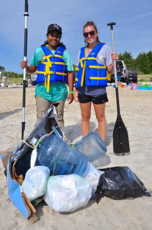 After the first race, there isn't much left of this Center for Inland Bays craft. Team members are Telicia Berry, left, and Leah Izzett. BY RON MACARTHUR
