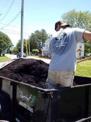 We deliver the mulch in our dump trailer and take the weeds and clean out material with us...like we were never there.