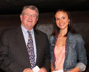 Lacey Perdue accepts the Georgetown-Millsboro Rotary Club Scholarship from Hugh Leahy. SOURCE SUBMITTED