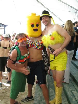 Wes Fruehaf modeling "Cowabunga", left, Travis White wearing a Lego man inspired piece, center, and Eric Parsons modeling "Bid Bird" pause to regroup together.