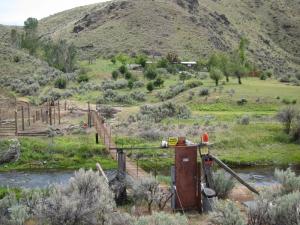 It can get right isolated in the canyons. This rancher had only a footbridge to get across the Powder River to his spread. He parked on this side and walked the rest of the way.