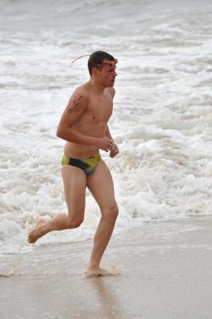 Matthew Bahama, 19, was the first to exit the water. He finished the race in fifth with a time of 34:03. BY NICK ROTH