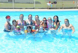 The pool was the favorite place to be during the high heat. Shown in back (l-r) are counselors Carol Breeding, Miranda Vickers, Caroline Breeding, Adrienne Dorley, Annie Manista, Jessica Peters, athlete Emma Hines, counselor Corrin Rogers and Olivia Davidson; in front are athletes Tayla Robeson, Ginger Shaud and Mikayla Buterbaugh. BY DAN COOK