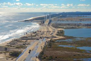 This photograph shows the overwash of Route 1 following Hurricane Sandy. Most of the northside beach was eroded. SOURCE DNREC