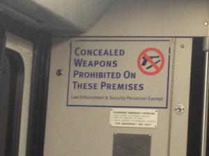 I wrote about guns in my Barefootin' column for the July 12 edition of Cape Gazette. This sign is on the St. Louis Metro. Like in Delaware, I guess it's OK to carry weapons in St. Louis as long as they aren't concealed.