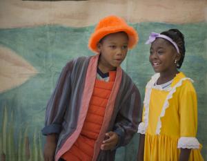 Ernest Loflan, as Nibs and Alaria Lewis as Toodles from the town of the lost boys share a joke as they prepare to travel with Peter Pan. BY DENY HOWETH