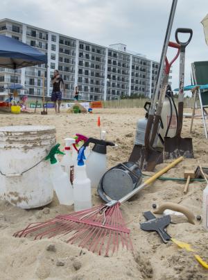 Tools of the trade: several types of misters, buckets for watery sand transport, masonry tools, shovels for heaving sand and a rake for the final touch-up. BY DENY HOWETH