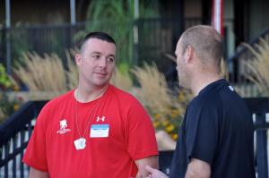 Jack Sheler, left, who works for the Wounded Warrior Project, came from Tampa, Fla., to support the event. BY RON MACARTHUR