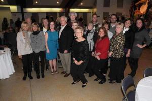 Jack Lingo Realtors gather for a photo. Shown in back (l-r) Steve Sumption, Joann Hollingsworth, Bill Wagamon, Bruce Geyer, and Michael Klecko. In the middle are Candy Niedoba, Sherry Hughes, Karen Maull, John Lingo, Suzanne Landon, Allyn Wagamon, Katie Landon, Lynn Larkins, Sarah Taylor and Amanda Barnes. In front are Amy Schrader, Katie Landon and April Irelan. BY STEVEN BILLUPS