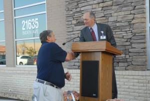 Georgetown Mayor Mike Wyatt welcomes Beebe Healthcare to Georgetown with a handshake to Beebe Healthcare CEO Jeff Fried.