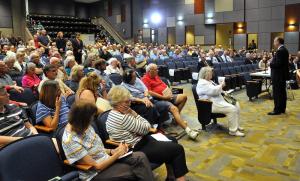 A large crowd turns out in the Cape Henlopen High School auditorium to listen and speak with the governor. BY RON MACARTHUR