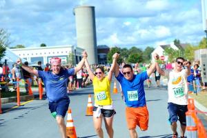 Four wide: Jay Ron Dean, Katrina Carr, Eric Lesage and John Defresne finish the 10K. BY DAVE FREDERICK