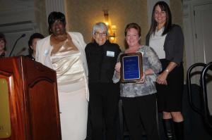 The Rehoboth Art League received the Community Partners Award. RAL has been partnered with First State providing art education to underserved and at risk children in 10 community sites across Sussex County. Shown are (l-r) First State Executive Director Bernice Edwards, RAL Board President Diane Beebe, RAL Executive Director Sheila Bravo and RAL Education Director Kim Klabe. BY STEVEN BILLUPS