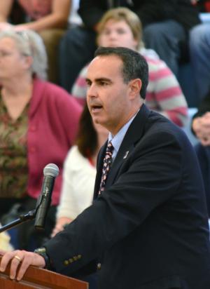 Delaware state Sen. Ernesto Lopez, R-Lewes, addresses the JROTC about the importance of their program. BY DAN COOK