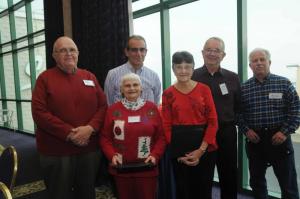 Receiving certificates for 125 to 150 hours of delivery hours are standing back (l-r) John Gladwell, Art Elkin, Bob Berger and Dick Steward. In front are Adele Gladwell and Rachel Berger. BY STEVEN BILLUPS