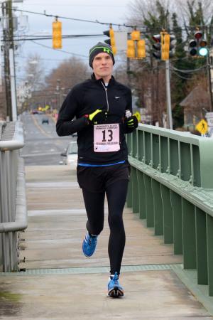 Allen Scott of Washington makes the halfway mark in second and finished second in the Rehoboth Marathon with a time of 2:39:35. BY DAN COOK