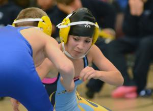Mariner's Yesenia Ramirez-Montano shoots on her Millsboro opponent, but falls short with a fall at :52 of the 100 pound class. BY DAN COOK