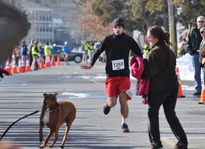 It turned into an obstacle course for race winner Steven Eshelman, as a loose dog tried to play a little defense at the finish line. BY NICK ROTH