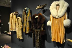 Attendees can guess who wore these coats as one of the centerpieces of the exhibit. BY RON MACARTHUR