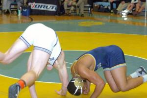 Brandon Wolfe, left, and Justin Lopez cautiously stay away from each other early in the 170-pound match. Wolfe would win 5-4. BY DAVE FREDERICK