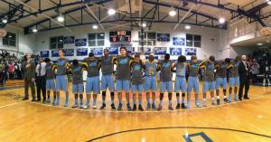 The Cape basketball team stands in unity during the national anthem before their showdown with the Blue Raiders. BY DAN COOK