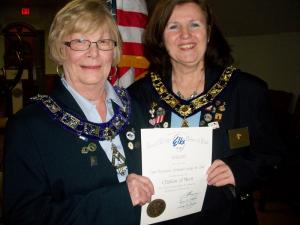 Lodge Secretary Gale Brand, left, receives a Citation of Merit from newly elected ER Eileen Loftus for her untiring efforts in achieving a lapsation of 2 percent for Cape Henlopen Elks Lodge 2540, which means that 98 percent of its members have continued to be active, dues-paying Elks. SOURCE SUBMITTED