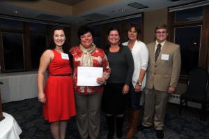 The Delaware Adolescent Program Inc. received a grant from the board. DAPI is the only statewide comprehensive school-based program in the nation that serves pregnant and parenting teens and their families. DAPI serves the community with the following programs: academic instruction, social services, child care and medical services. Shown presenting the grant are (l-r) Danielle Glenn, Woodbridge High School; Kim Trivits, DAPI Sussex County center director; Susan Carmine, administrative assistant; Jodi Murro, nurse educator; and Grant Pollack, Seaford High School. BY STEVEN BILLUPS