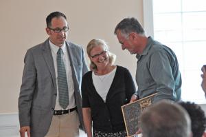 Hal and Holly Brundage share a laugh with Lewes Historical Society Executive Director Mike DiPaolo after receiving a plaque to go along with their Restoration Award honor. BY NICK ROTH