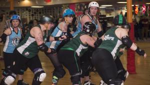 Trying to get SoDel jammer Jamie Doerfler (Betty ClockHer) through is Elayne Jones (Mila Choke A'Bitch), as Jennifer White (Adorabully) catches up to the pack. BY DENY HOWETH