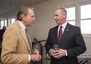 Superior Court Judge Henly Graves, left, talks with Department of Correction Commissioner Robert Coupe. BY DENY HOWETH