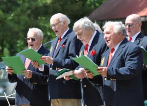 Members of the Nautical Sounds (l-r) George Macintire, Jim Brown, Dave Grassey, Mike Burkhart and Charlie Abrachinsky perform "The Sword of Freedom." BY NICK ROTH