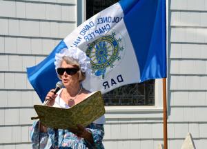 DAR Regent Nancy Barlow welcomes guests to the annual wreath laying ceremony at the gravesite of Revolutionary War hero Col. David Hall, the Lewes chapter's namesake. Col. Hall, a Lewes lawyer who was elected governor in 1802, commanded his troops in several battles and was wounded during the Battle of the Brandywine. He was also with Gen. George Washington at Valley Forge, Pa. BY RON MACARTHUR