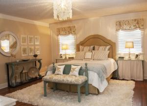 A comfortable and romantic master bedroom was created by Cyndi Oronzio of Dreamweaver Interiors. BY DENY HOWETH