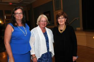 Shown are the organizers of the Woman's Day ceremony (l-r) Alison Buckley, alumni coordinator; Conny Wertz, alumni association president; and the Hon. Harriet Smith Windsor, former Delaware Secretatry of State and event MC. BY STEVEN BILLUPS