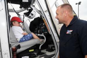 Sitting at the controls of a Delaware Life Net helicopter is Chance Gunter of Lewes. Life Net Paramedic asks Gunter if he is ready to take off. BY STEVEN BILLUPS