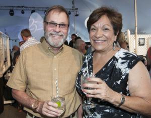 Artist William Patterson and Rose Murray, RAL development manager, enjoy the live auction. BY DENY HOWETH