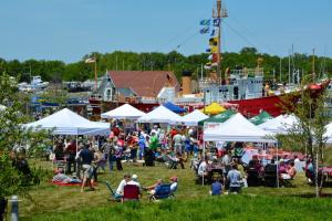 Hundreds fill Canalfront Park to take part in the third annual Picnic in the Park. Thirteen Lewes vendors were ready under white tents to offer food. BY RON MACARTHUR