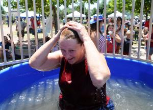 Milton Mayor Marion Jones was a popular target in the dunk tank which raised funds for next year's July Fourth events. BY DAN COOK