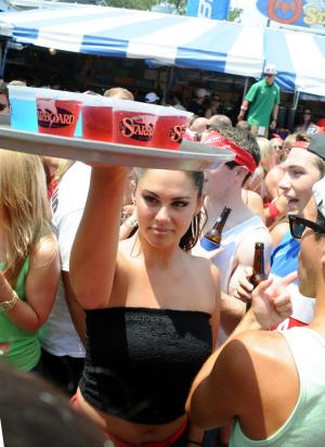Starboard's Pari Papaidannu serves colorful shooters during the festivities. BY DAN COOK