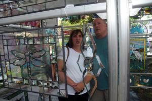 Dan and Joanne Schramm of Lewes shop in the Classic Glass Studio from Florida booth. BY STEVEN BILLUPS