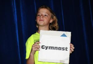 The campers held signs celebrating what you could be when you discover the "greatness" within. Melody Sylvia,11, wants to be a gymnast. BY DAN COOK