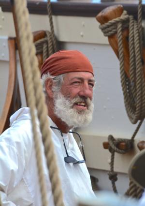 Colin McGowan is one of nearly two dozen volunteer crew members during each sail. Three-hundred active and fully trained volunteers and officers make up the crew of the ship. BY RON MACARTHUR