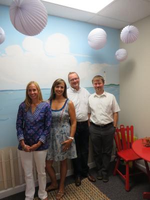 At the offices of Delaware Psychological Services (l-r) Alisha Melesky joins her colleagues Dr. Katherine Elder, Stephan Kastner and Dr. Matthew Turley in the children's play therapy room. BY MOLLY MACMILLAN