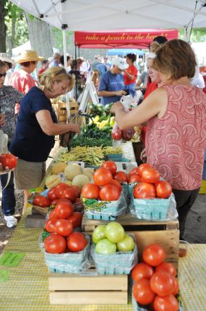 Thousands of people made their way through the Historic Lewes Farmers Market Aug. 9 in search of tomatoes, peaches and other savory selections. BY NICK ROTH