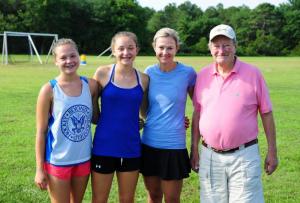 Three generations from the Mid-Atlantic Field Hockey Camp are (l-r) twin sister campers Emily and Lauren Treacy, 14, their mother and former camper, junior counselor and coach Chrissy, and her father, former camp owner Richard Miller. DAN COOK PHOTO