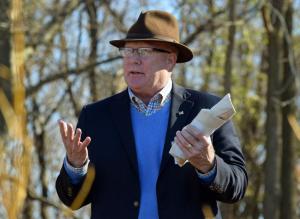 Landscape architect Rodney Robinson talks about gardens bridging the divide among people during a groundbreaking ceremony Dec. 1.