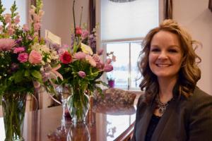 Congratulatory flowers are on display in Kristy Rogers’ office after she was recently promoted to town manager.
