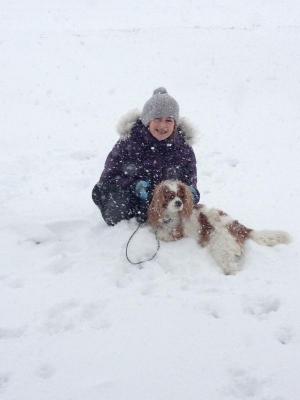 Olivia Burkentine and her dog Sandy enjoy a snow day. PATTY BURKENTINE PHOTO
