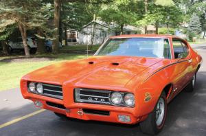 After sitting 38 years in storage, the Dunbars’ GTO Judge was completely disassembled and restored to its showroom condition with matching manufacturer numbers for its original engine, transmission and rear end. Bob said earlier GTOs were of a boxier style. “This was the first year of a style called the Coke bottle.”