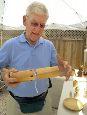 Woodcrafter Roger Galbraith shows his Wood-Be Treasures, here a watch tower pepper mill.